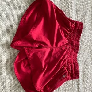 Red Lululemon running shorts